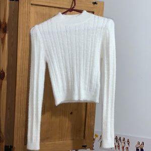 Soft cropped white sweater.